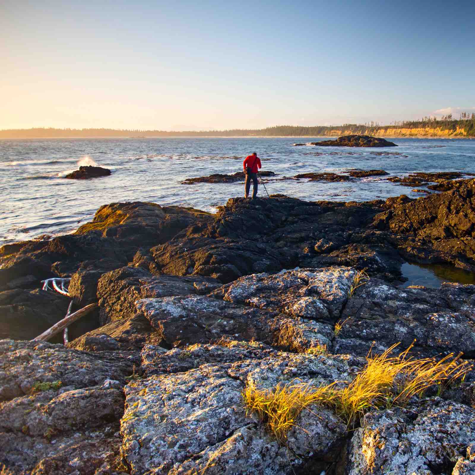 Man walking on beach rock | Vancouver Island Lifestyle